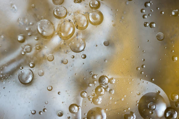 istock Abstract image of bubbles on the water, on a colored background. 912396806
