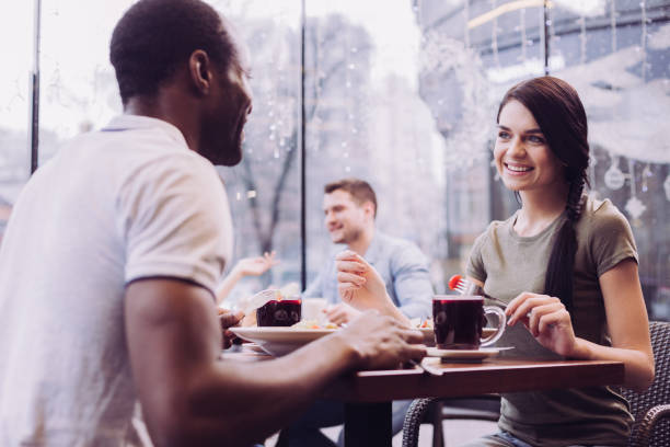 istock Joyful jolly couple chatting at cafe 912400410