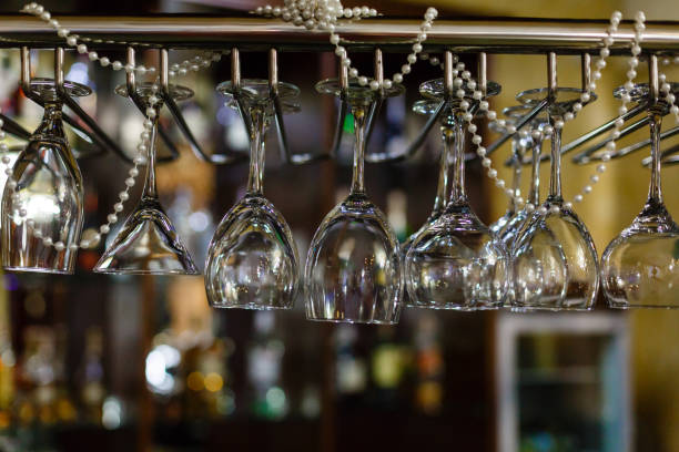 istock Empty glasses for wine above a bar rack 912402026
