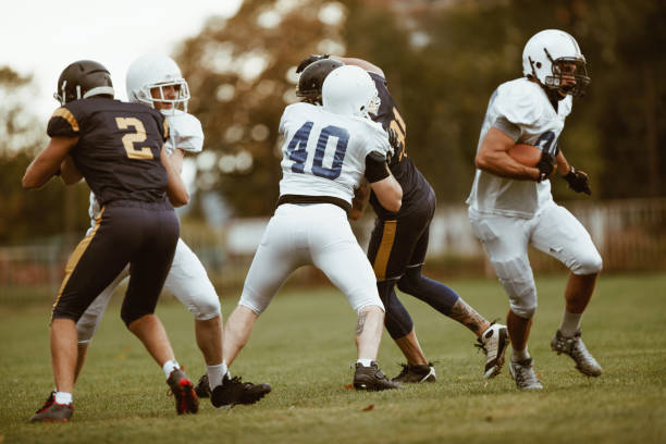 istock American football match on a field! 912404374
