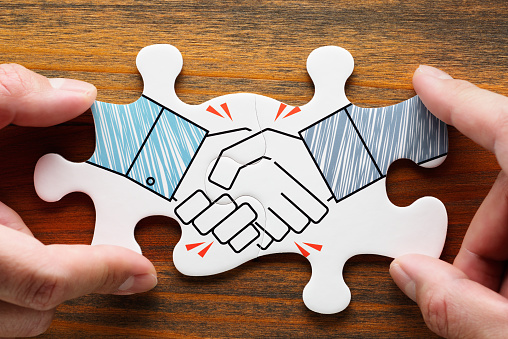 Concept image of business partnership and collaboration.