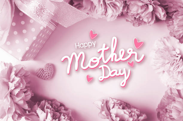 istock Happy mothers day message and carnation flowers and gift box 912412536