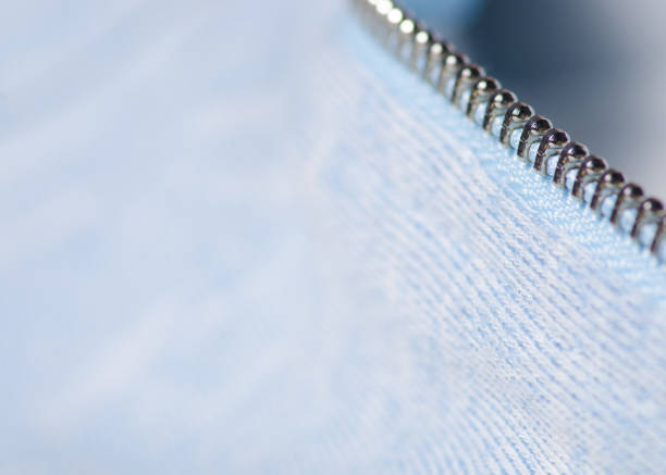 istock Blue fabric clothes zipper shirt macro 912417228