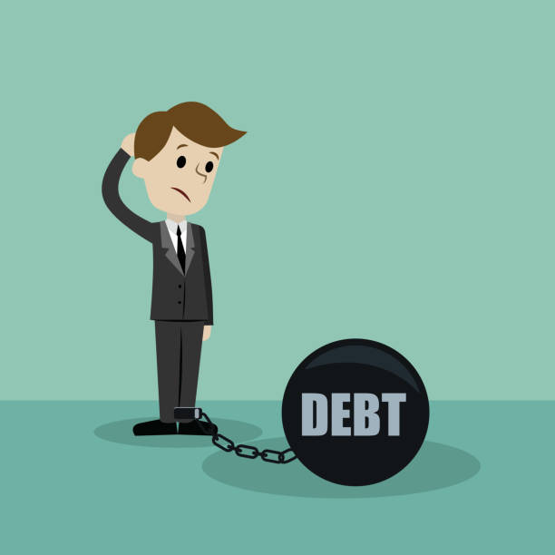 istock Businessman or manager has a debt as a chain on his leg. 912426284