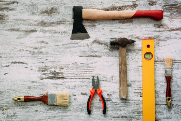 istock Tools for repairing on grey wooden background 912426664
