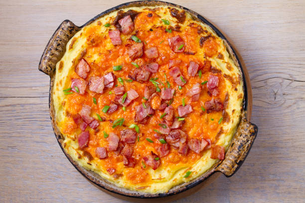 istock Cheddar Mashed Potato Casserole with Bacon. Baked Cheddar Potato Casserole 912426854