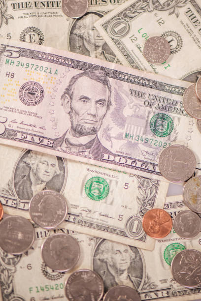 istock us currency american dollars paper notes and coins 912435228