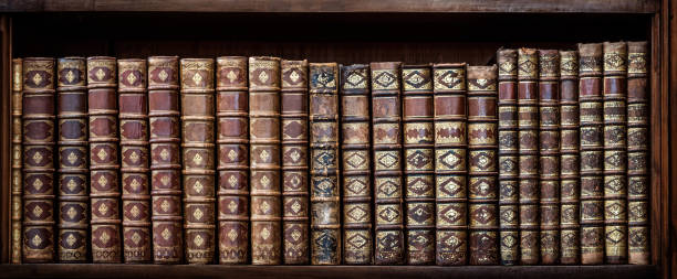 istock Old books on wooden shelf. 912438674