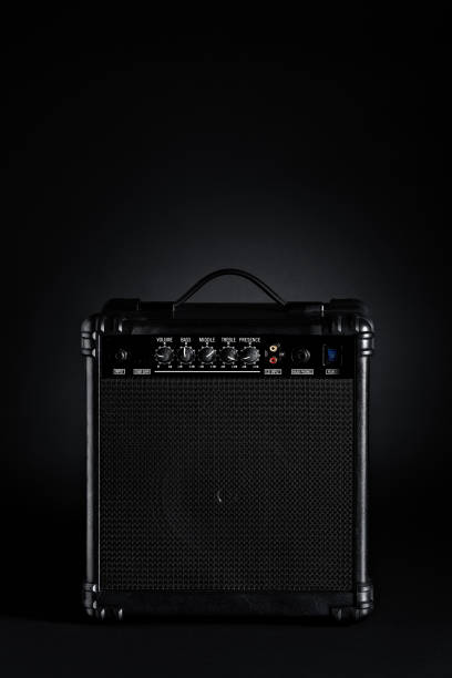 istock Bass guitar amplifier on black background 912442322