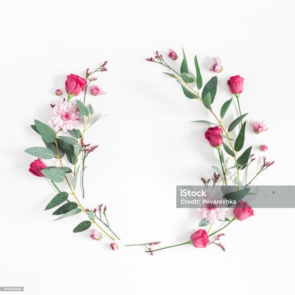 Flowers wreath on white background. Flat lay, top view Flowers composition. Wreath made of various pink flowers and eucalyptus branches on white background. Flat lay, top view, copy space, square Flower Stock Photo