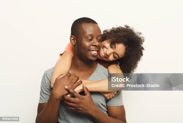 Black Couple Hugging And Posing At White Background Stock Photo - Download Image Now