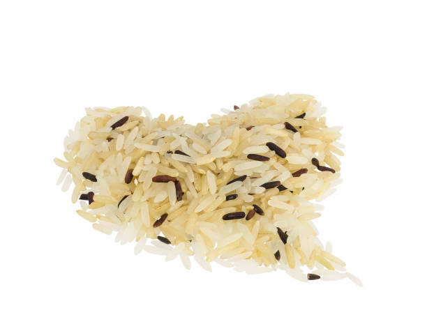 istock Raw mixed germinated brown jasmine rice heart shaped isolated 912454012