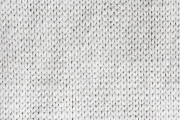 White Knitted Wool Background. Macro photo of white knitted wool Crochet stock pictures, royalty-free photos & images