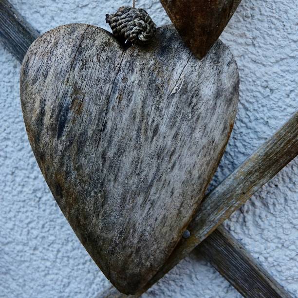 istock Heart shaped weathered wood 912457030