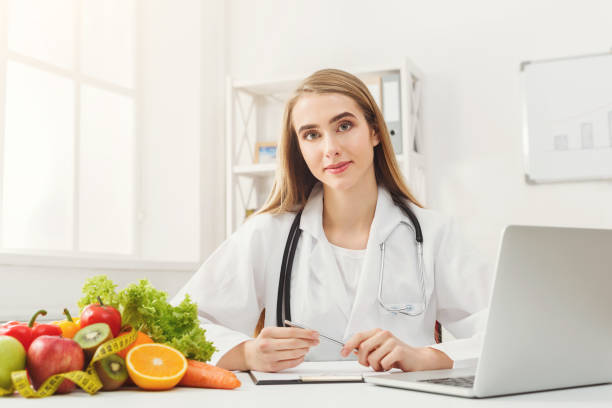 istock Female nutritionist working on laptop 912466986