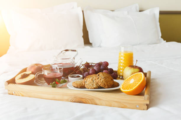 istock Breakfast served in bed on wooden tray 912467110
