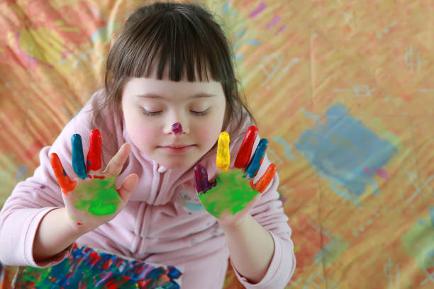 istock Cute little girl with painted hands 912476876