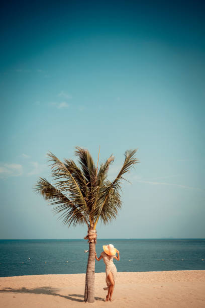 istock Woman at tropical beach 912481852