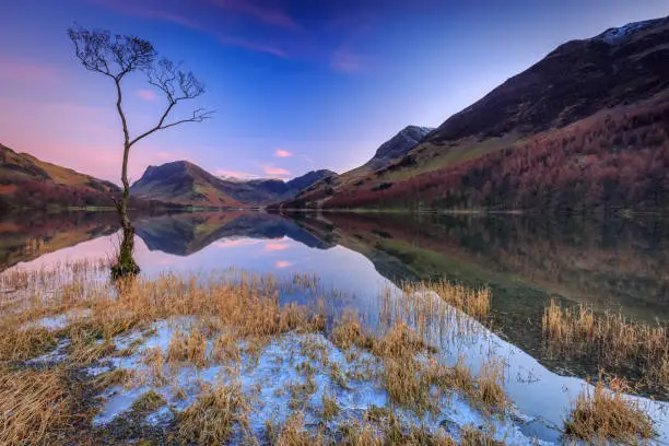 Twilight reflection at Buttermere in The Lake District, Cumbria, England