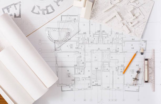 proyecto de arquitectura, ingeniería de herramientas sobre la mesa. - drawing compass blueprint architecture plan fotografías e imágenes de stock