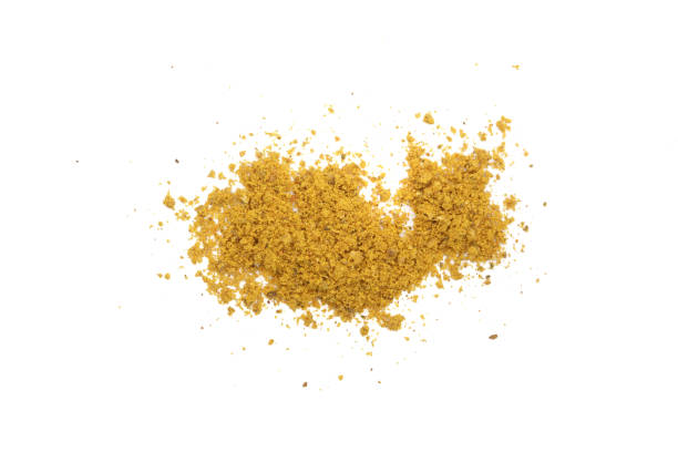 istock curry powder isolated on white background. Top view 912489962