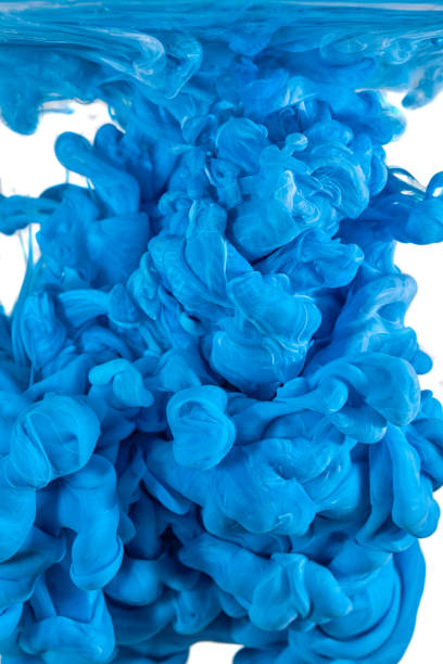 istock Close-Up Of Blue Paint Splashing Against White Background 912490554