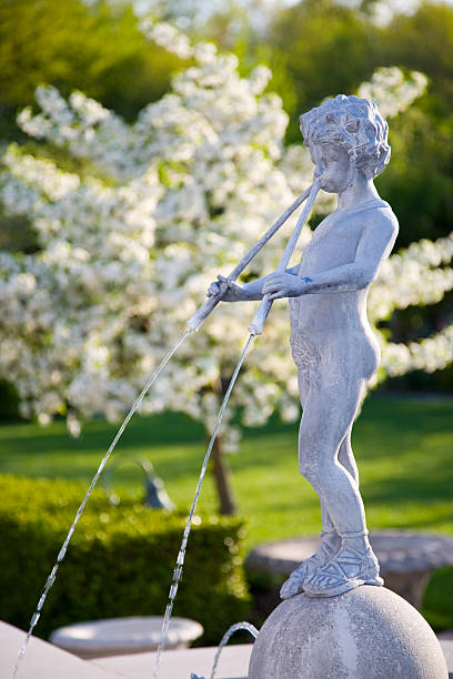 Cherub Fountain  fountain courtyard villa italian culture stock pictures, royalty-free photos & images