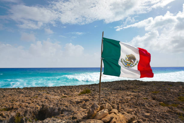 Cozumel island El Mirador beach in Mexico Cozumel island El Mirador beach in Riviera Maya with Mexican flag mirador stock pictures, royalty-free photos & images