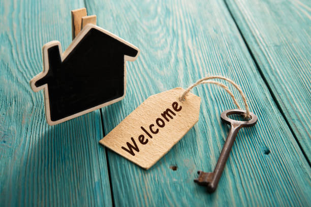 istock hotel key with welcome tag on the wooden background 912492738