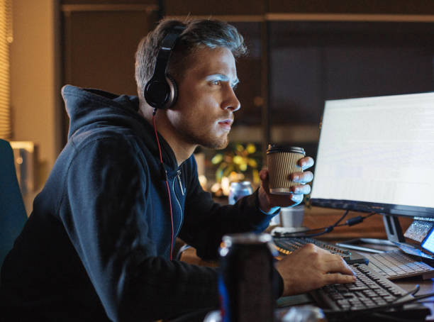 istock Calm male having job with gadgets 912498338
