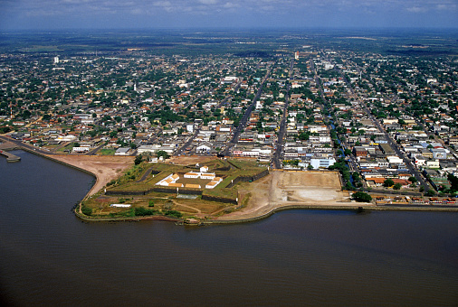 The fortification is the city´s landmark, located exactly where the Equator Line divides the world. At the bottom, the Amazon River. Macapá city is the capital of the state of Amapá.
