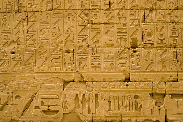 istock Egyptian hieroglyphics - Karnak temple at Luxor in Egypt 91250026