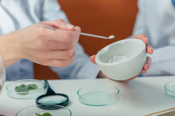 istock biologist with petri dishes 912501130
