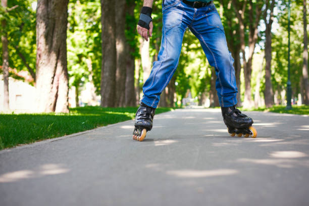 istock Male legs in jeans and roller skates 912501700