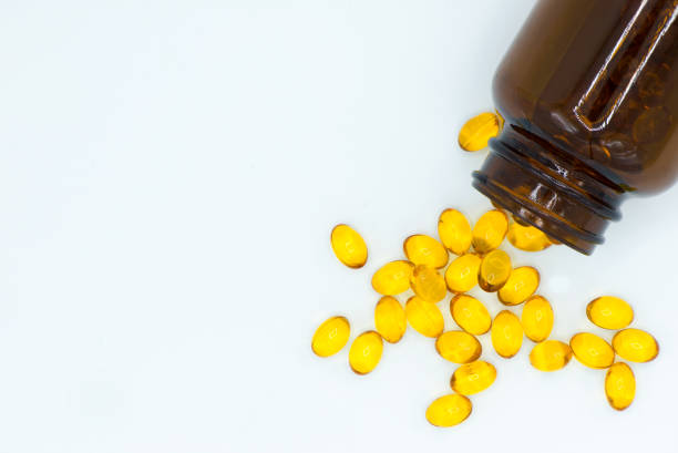 The bottle of cod liver oil’s  capsules. stock photo
