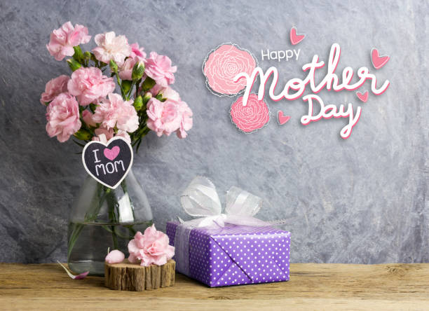 happy mothers day concept of pink carnation flowers in bottle with i love mom letter on heart wood and violet  gift box - flower head bouquet built structure carnation imagens e fotografias de stock