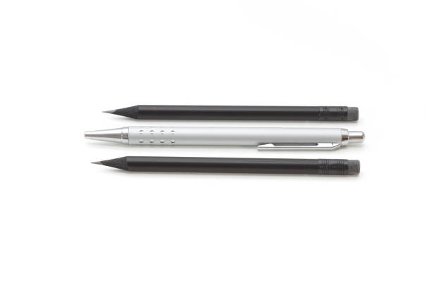 istock Set of two pencils and a biro agains a white background 912505540