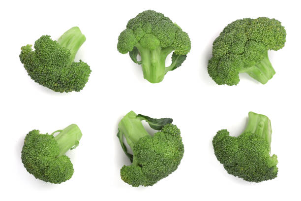 istock fresh broccoli isolated on white background close-up. Top view 912505664