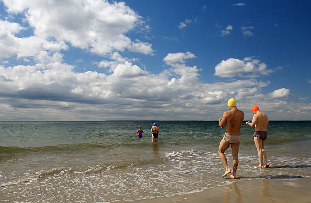 going for a swim stock photo