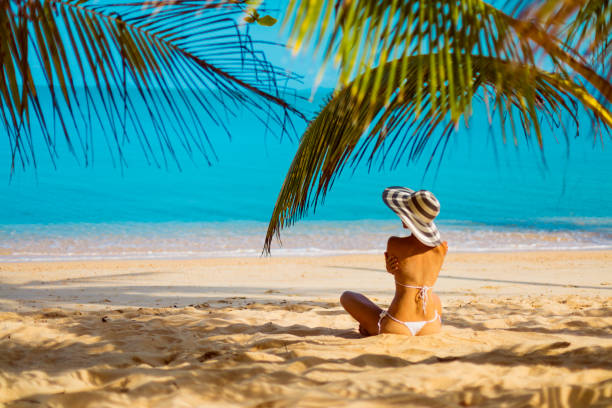 istock Woman at tropical beach 912510080