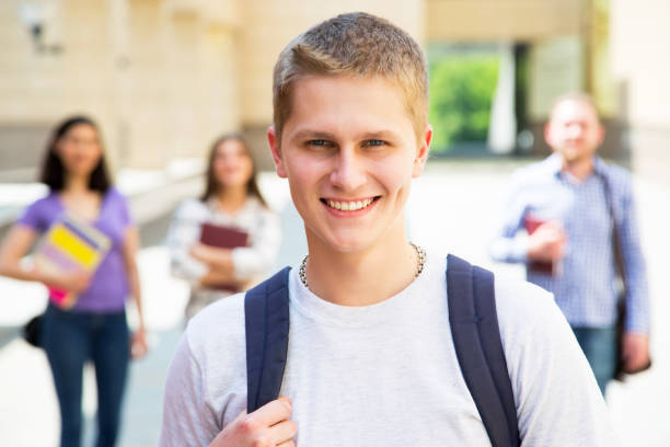 istock Happy students outdoors 912521604