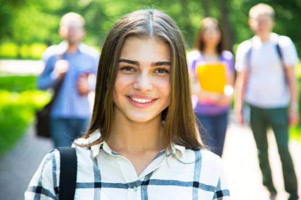 istock Female students outdoors with her friends 912524070