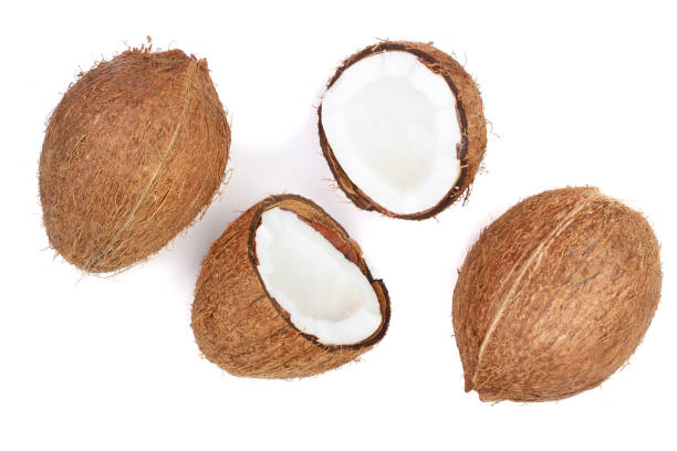 istock whole coconut with half isolated on white background. Flat lay. Top view 912524428