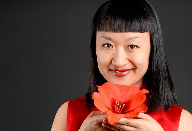 istock Asian Woman and Amaryllis 91252602