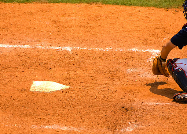 istock Baseball Catcher at Homeplate during a Baseball Game 91253020