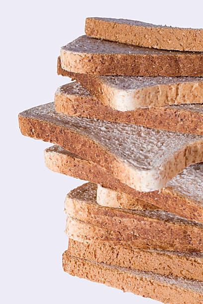 Stack of bread slices, isolated stock photo