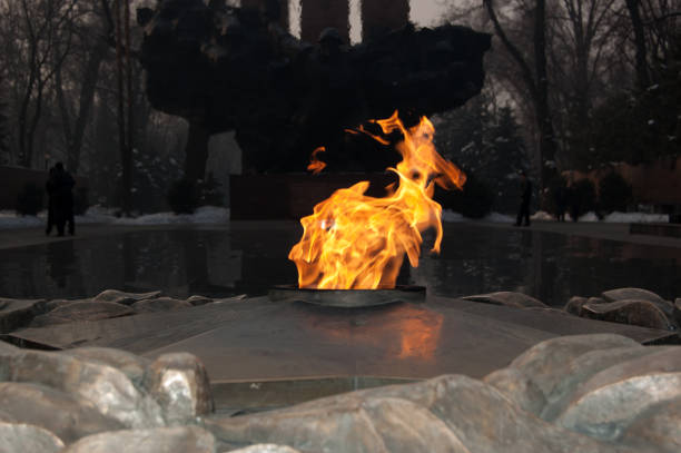 An eternal flame commemorating the fallen of 1917-20 (the Civil War) and 1941-45 (WWII), burns in front of the giant black monument of soldiers from all 15 Soviet republics.