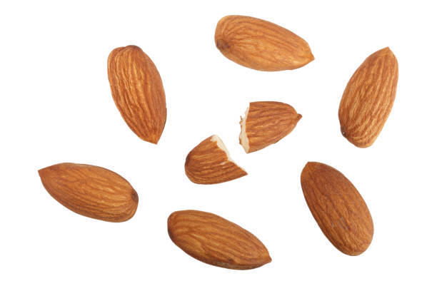 istock almonds isolated on white background without a shadow close up. Top view 912544878