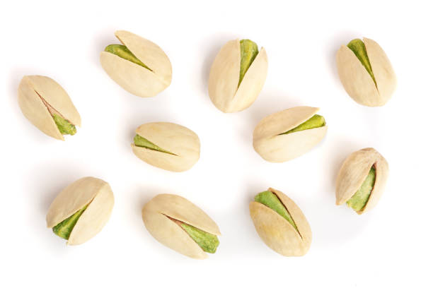 istock Pistachios isolated on white background, top view. Flat lay 912545626