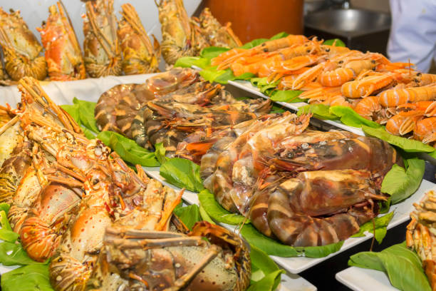 istock Royal prawns on green lettuce leaves 912545632